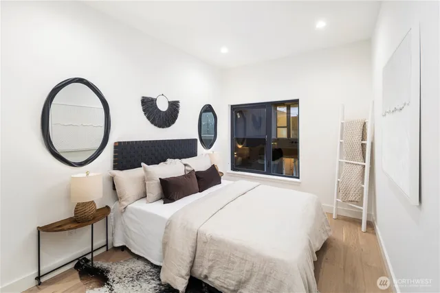 a bedroom with bed and a closet