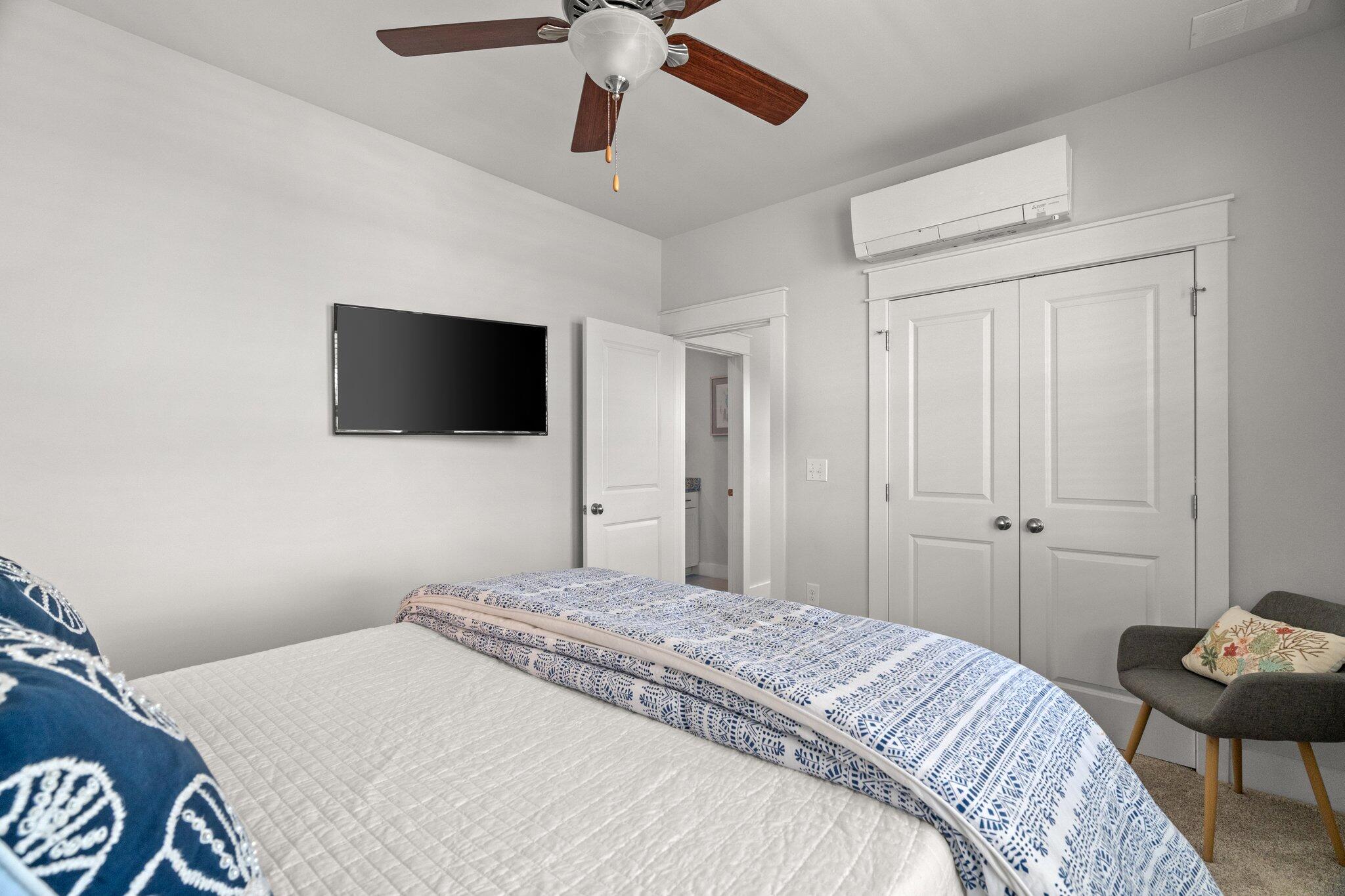 33 Valdare Way Inlet Beach, FL 32461 - Photo 54 of 76 a bedroom with a bed and a flat screen tv