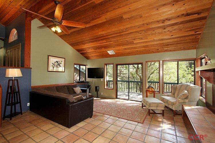 5307 Cascabel Road Atascadero, CA 93422 - Photo 8 of 25 a living room with furniture and a flat screen tv