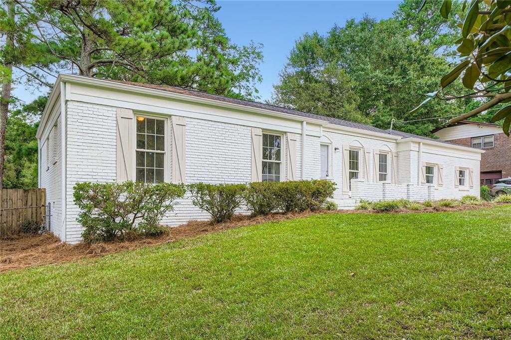6678 Collier Way Riverdale, GA 30296 - Photo 4 of 29 a view of a house with backyard and garden