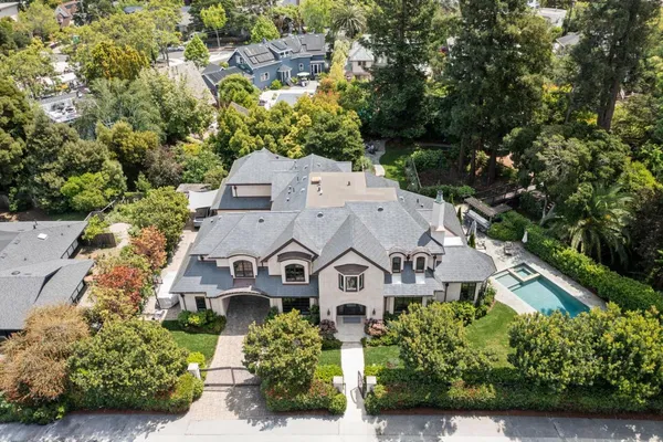 an aerial view of a house with a garden