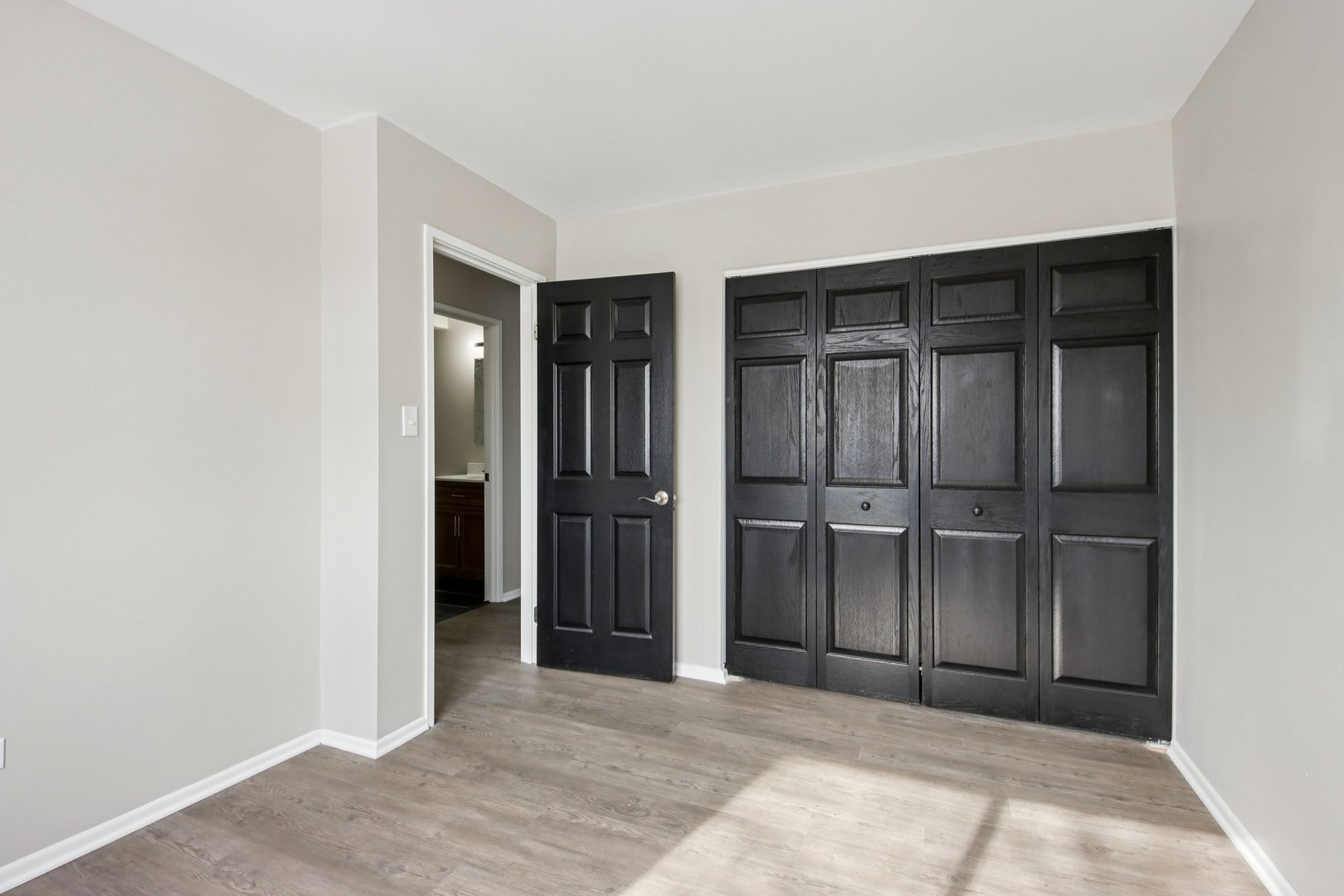 1111 Bloomingdale Road, Unit 2A Glendale Heights, IL 60139 - Photo 19 of 26 an empty room with closet and entryway
