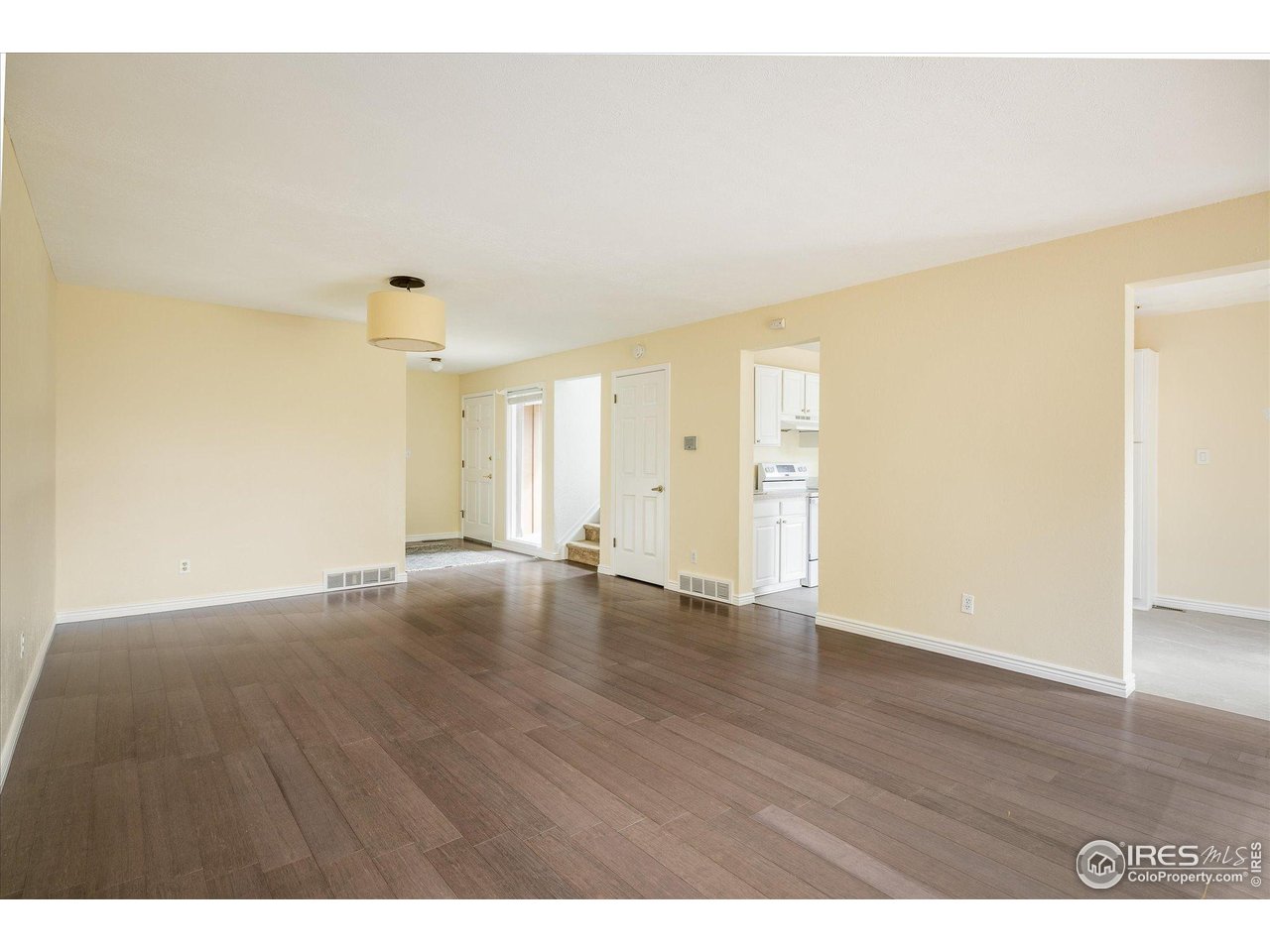 1209 Harrison Court Boulder, CO 80303 - Photo 14 of 35 a view of an empty room and wooden floor