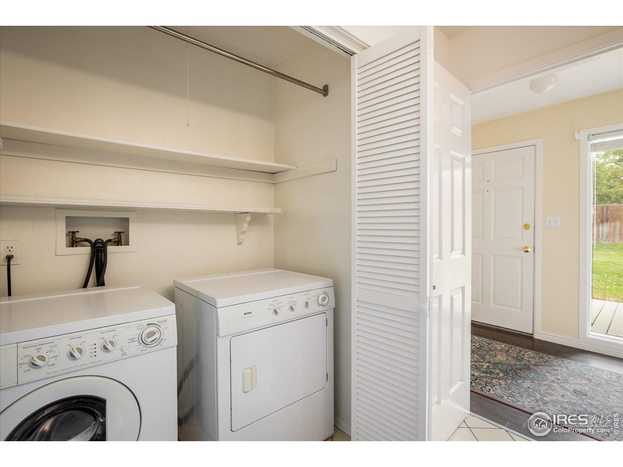 1209 Harrison Court Boulder, CO 80303 - Photo 22 of 35 a utility room with dryer and washer