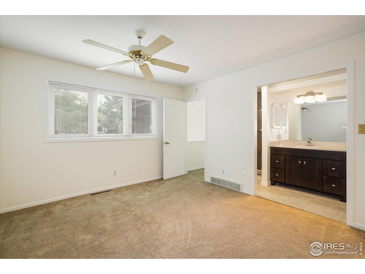 1209 Harrison Court Boulder, CO 80303 - Photo 23 of 35 a view of an empty room with a window