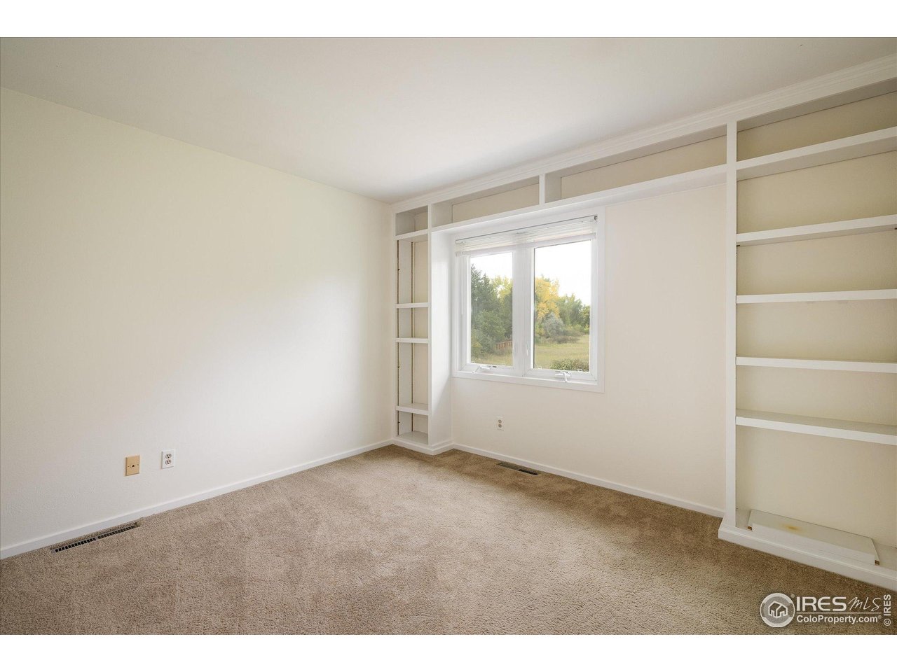 1209 Harrison Court Boulder, CO 80303 - Photo 25 of 35 a view of an empty room with a window