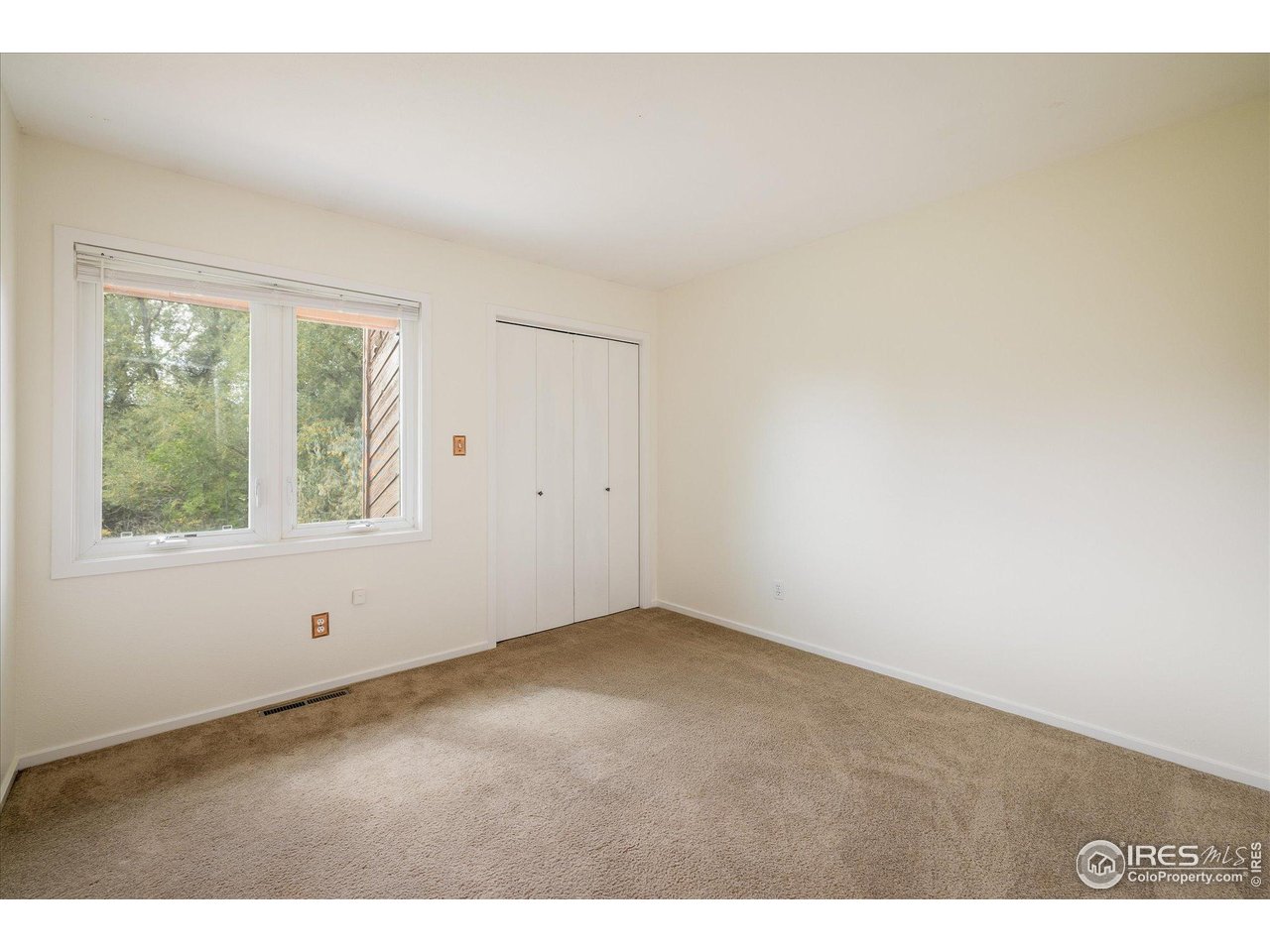 1209 Harrison Court Boulder, CO 80303 - Photo 27 of 35 a view of an empty room with a window