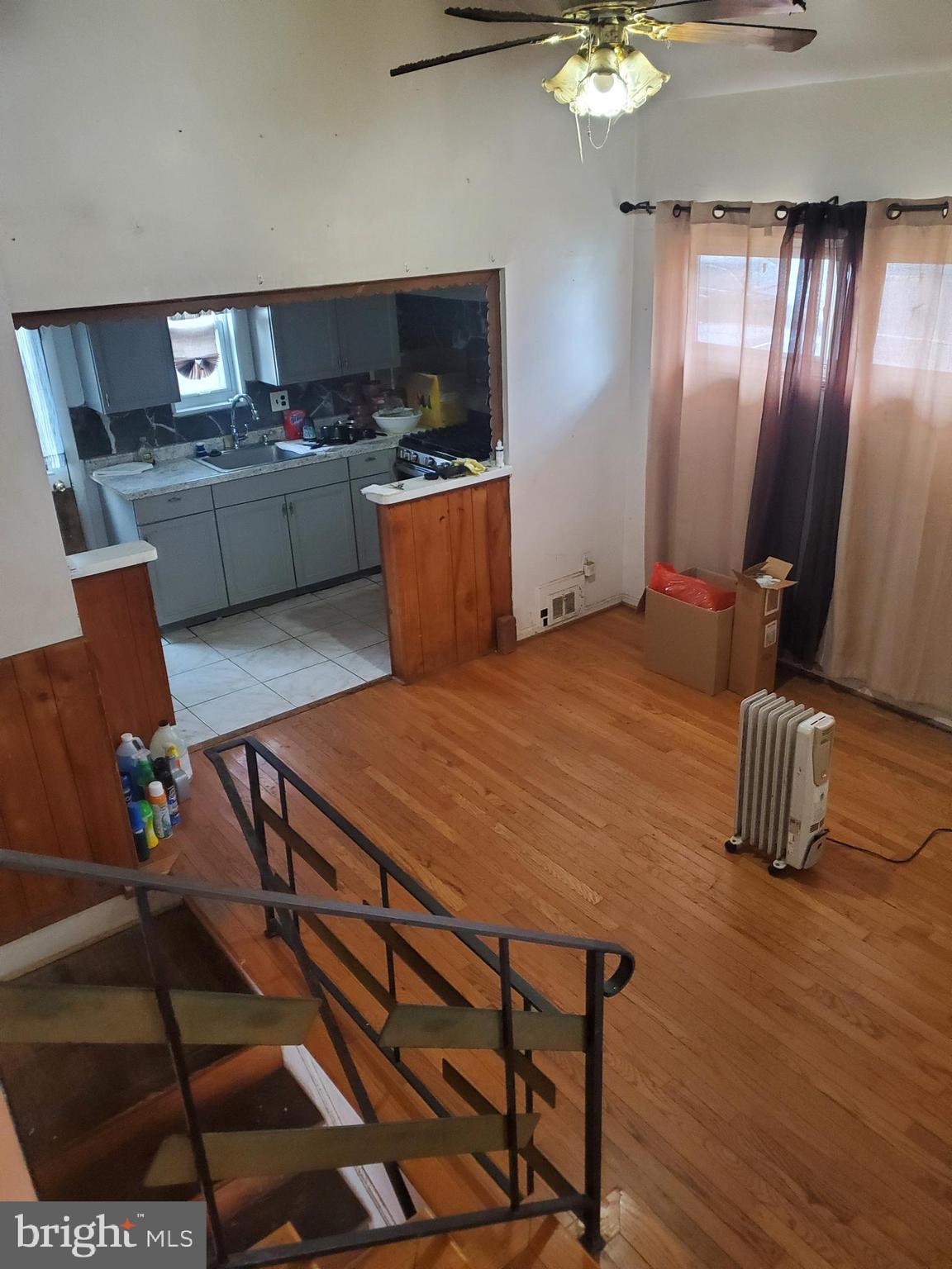 a bed room with furniture and a chandelier