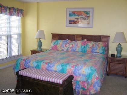 1505 Salter Path Road, Unit 313 Indian Beach, NC 28512 - Photo 7 of 10 2 walk in closets, full bath and entry to deck