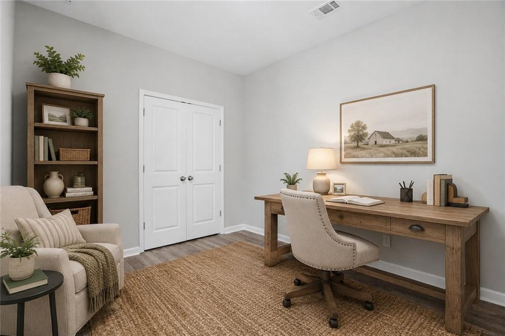 314 Coady Road Jackson, GA 30233 - Photo 21 of 31 a view of a workspace with furniture and wooden floor