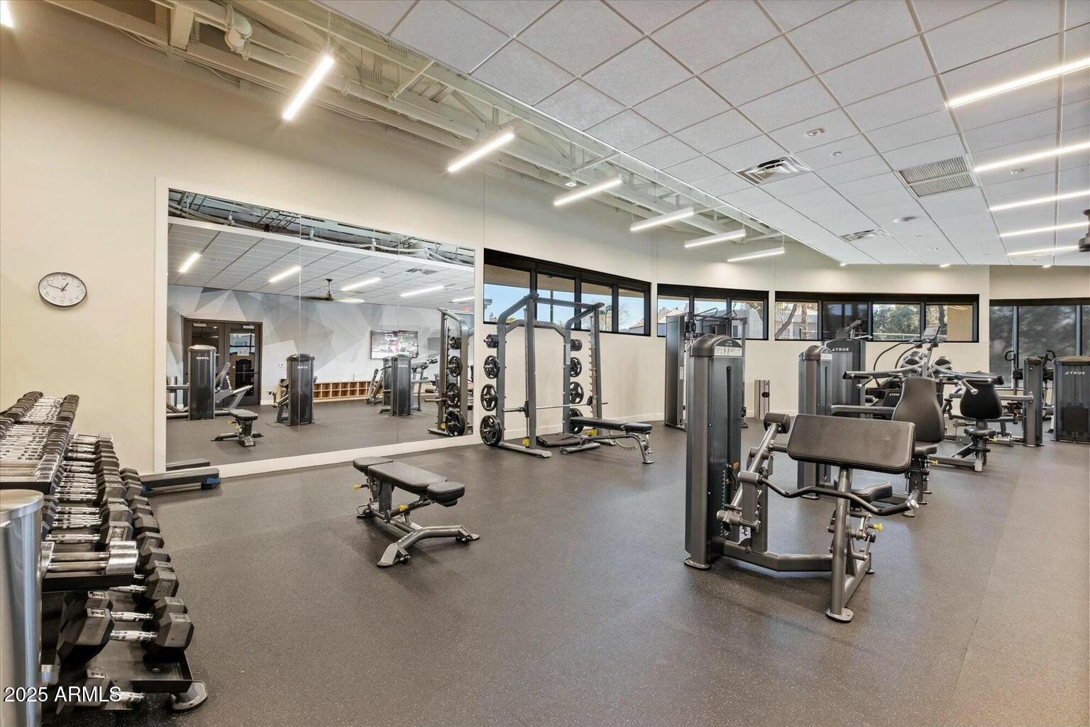 7710 East Gainey Ranch Road, Unit 139 Scottsdale, AZ 85258 - Photo 30 of 38 a view of a room with gym equipment