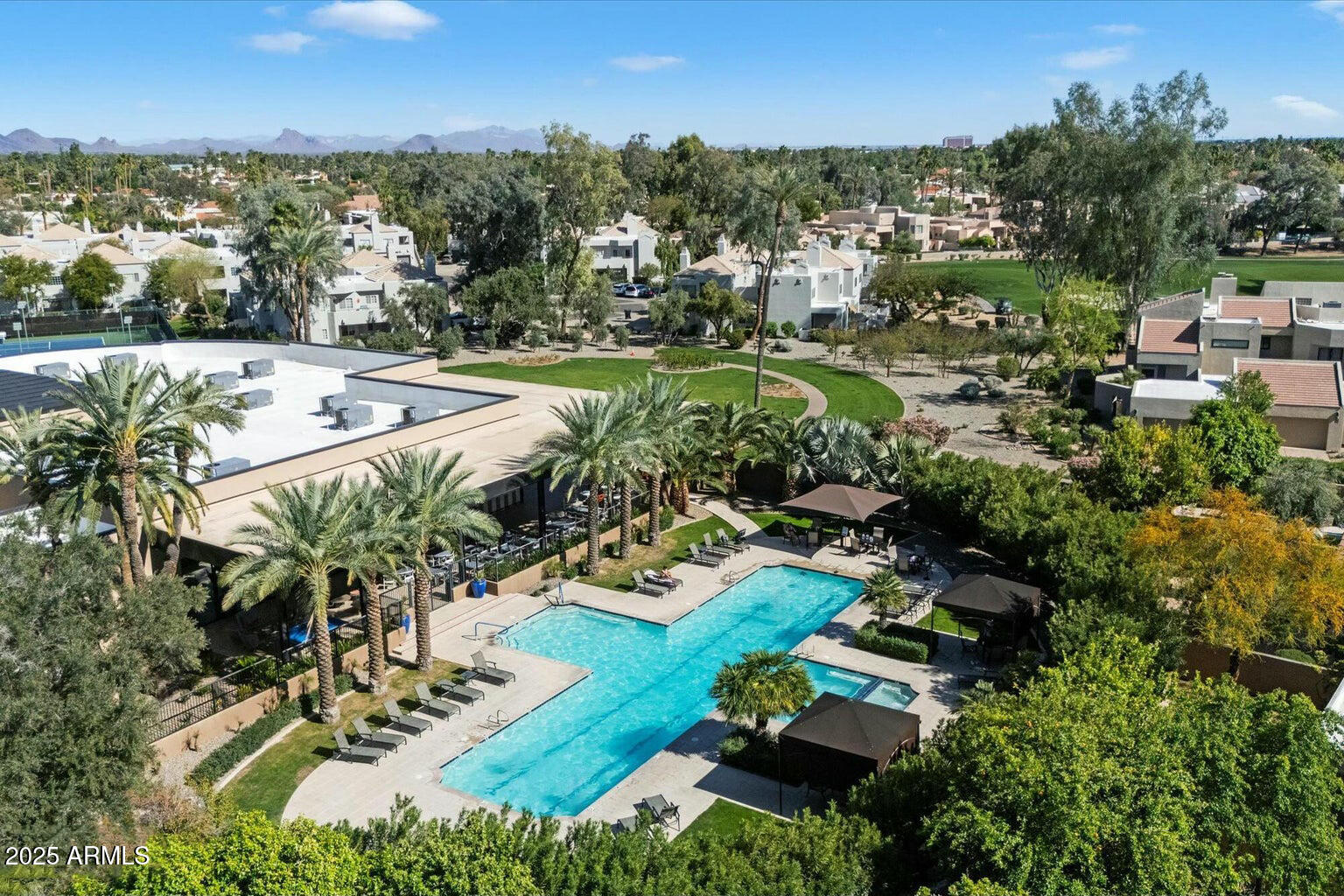 7710 East Gainey Ranch Road, Unit 139 Scottsdale, AZ 85258 - Photo 4 of 38 an aerial view of multiple house