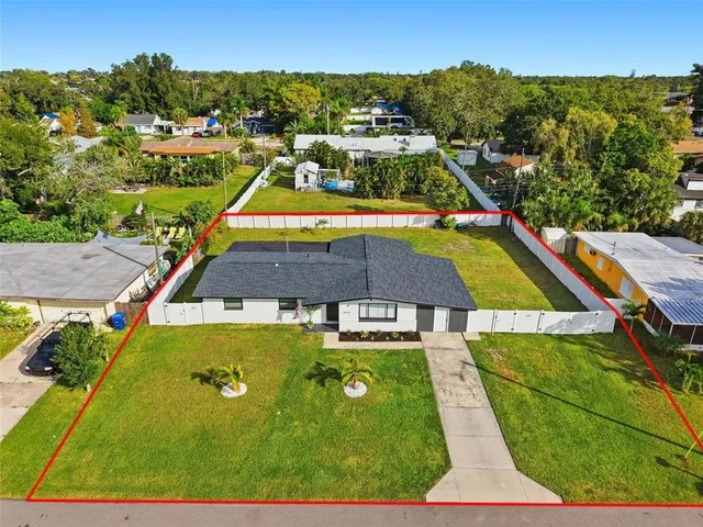 a view of an outdoor space pool patio and lake view