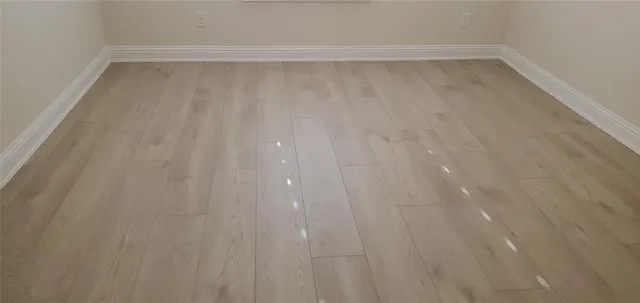 a large living room with stainless steel appliances kitchen island granite countertop furniture