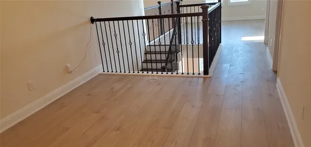 a view of wooden floor and staircase