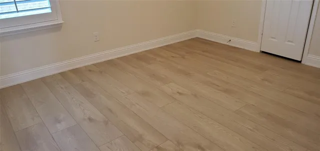 an empty room with a window