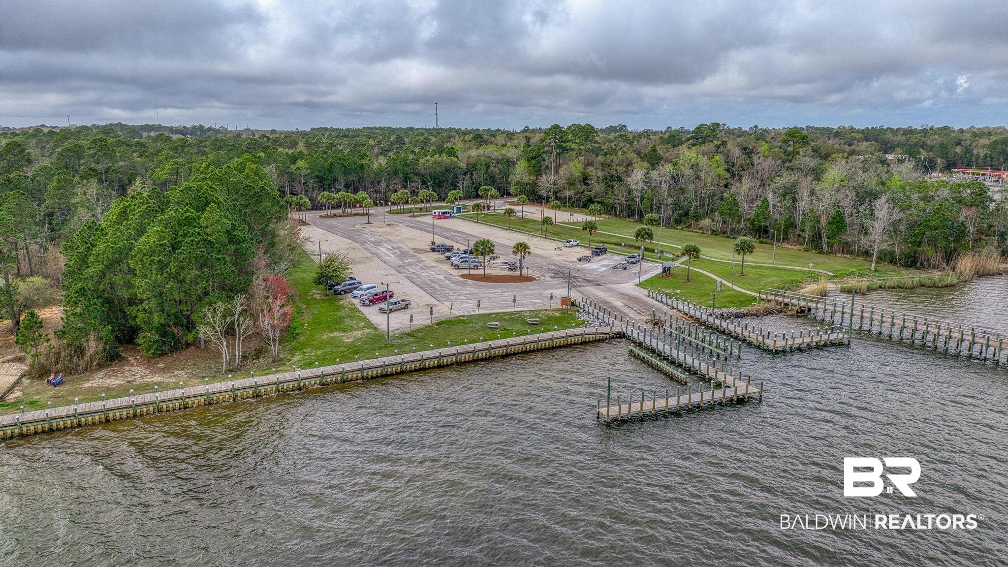 32875 Faircloth Road Lillian, AL 36549 - Photo 79 of 85 Bird's eye view of a large body of water and a heavily wooded area