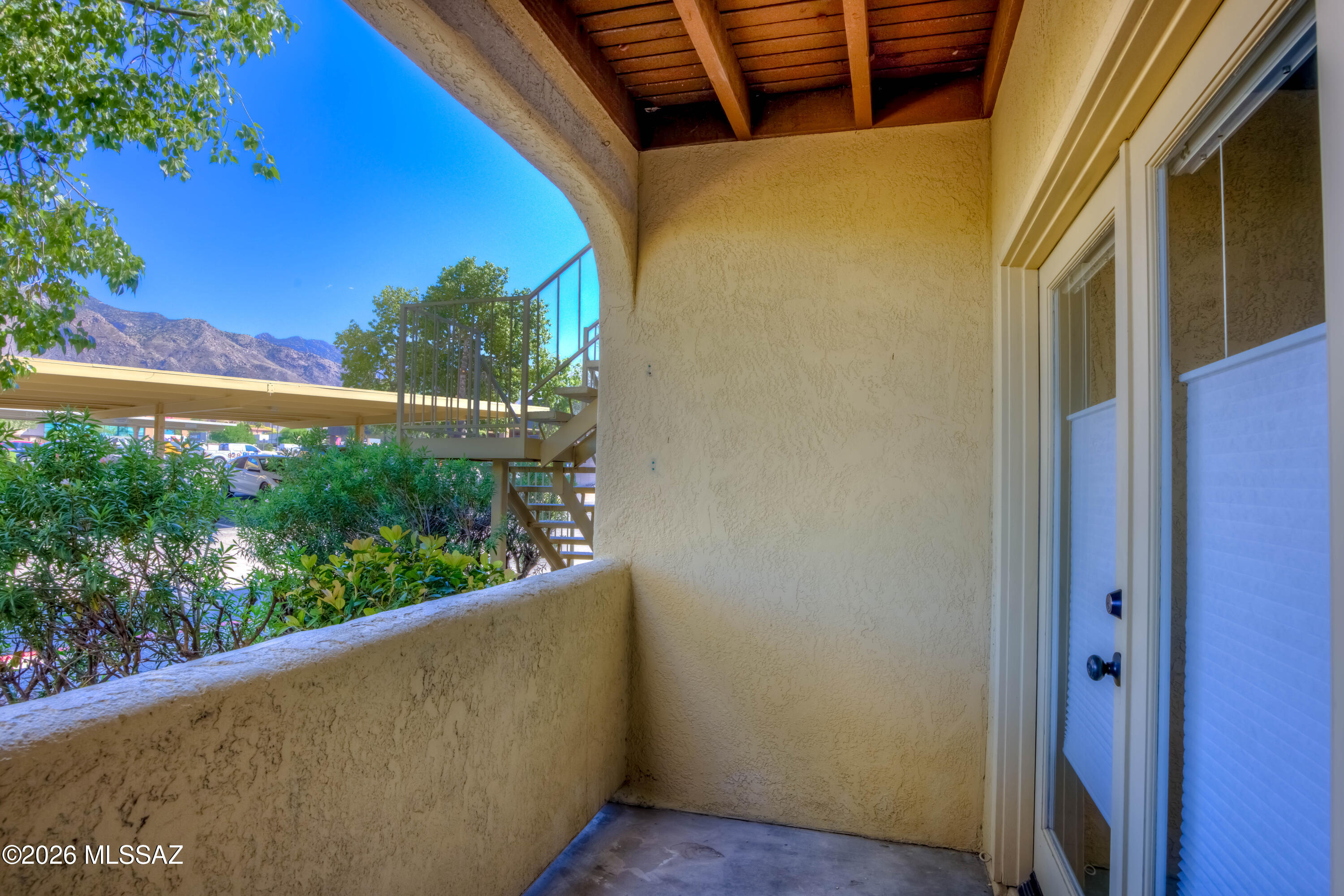 5500 North Valley View Road, Unit 123 Tucson, AZ 85718 - Photo 31 of 36 a view of balcony with wooden floor
