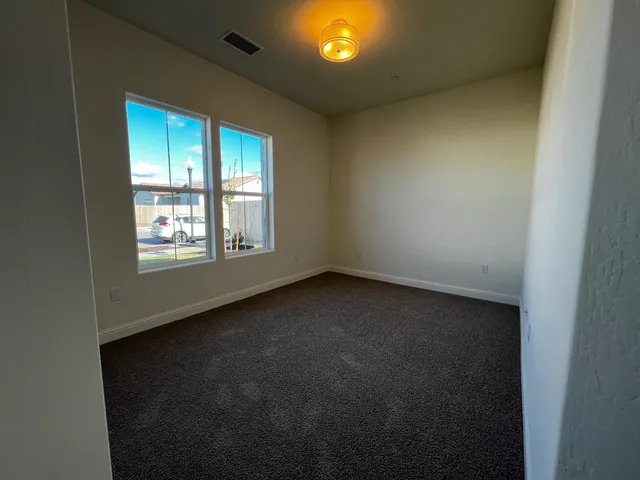 a bathroom with a sink toilet a shower and a mirror