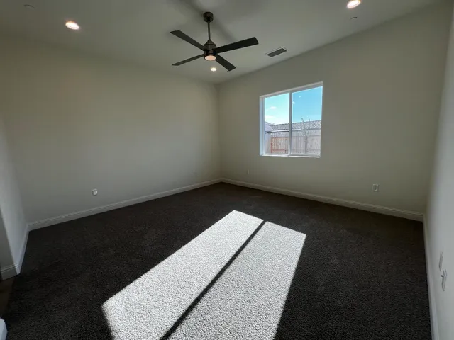 a bathroom with a double vanity sink and mirror