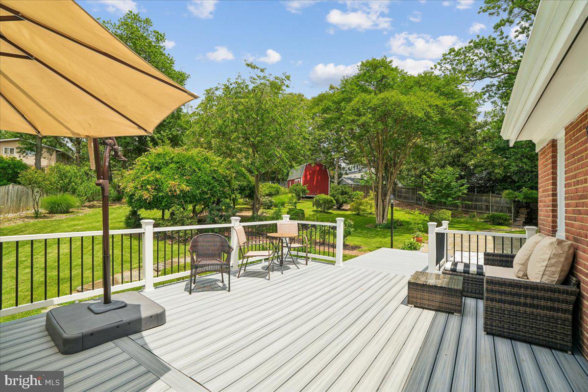 1305 Key Drive Alexandria, VA 22302 - Photo 3 of 64 a view of balcony with wooden floor and outdoor seating