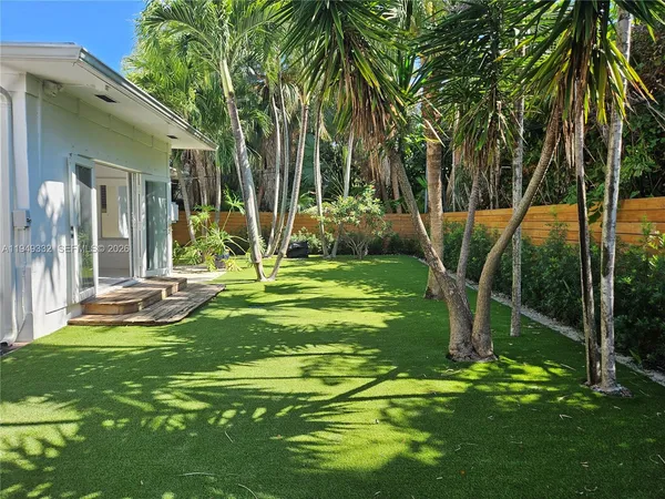 a view of a backyard with a garden
