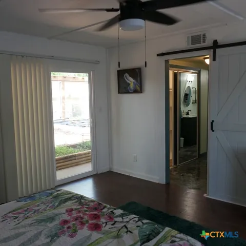 a view of front door and bedroom stairs