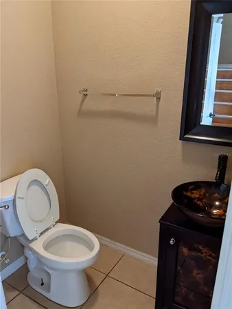 a bathroom with a toilet and a sink