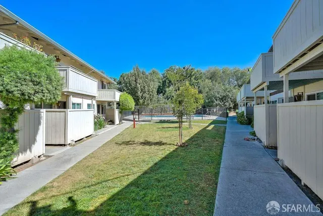 a view of a house with swimming pool