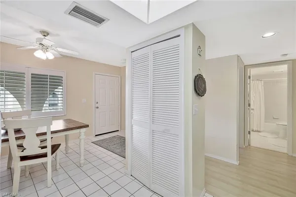 a view of kitchen with furniture and wooden floor