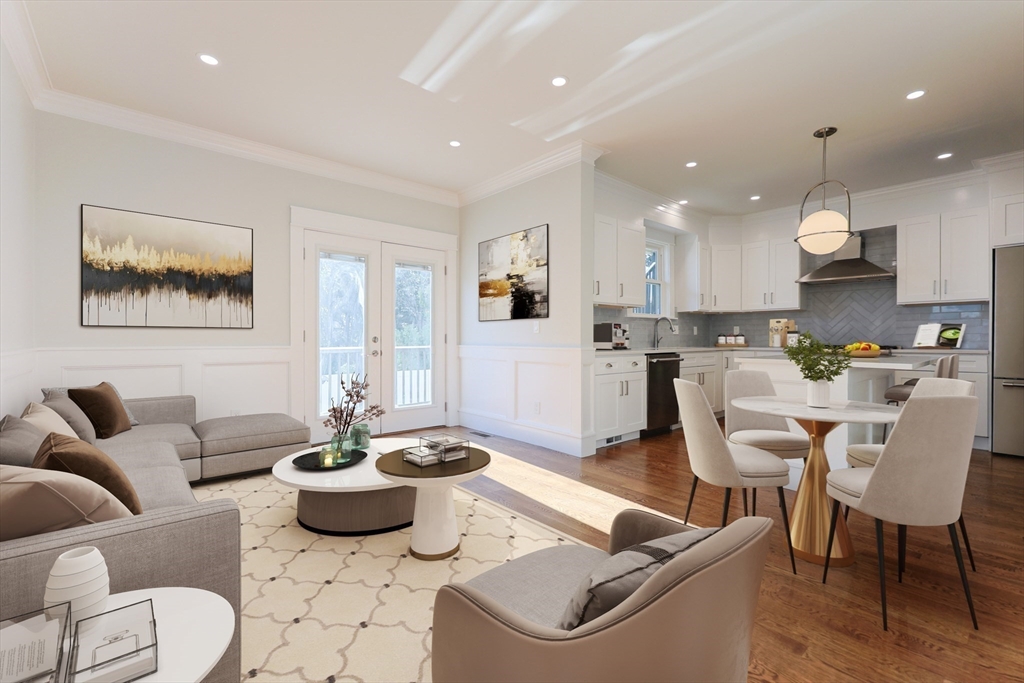 a living room with furniture kitchen and a table