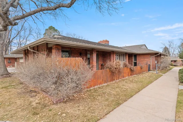 a front view of a house with yard
