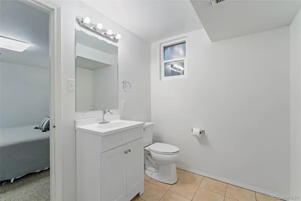 a view of an empty room with storage
