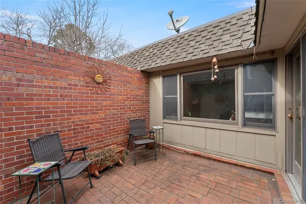 a view of a house with a tree