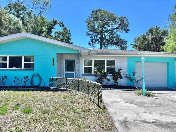 front view of a house with a patio
