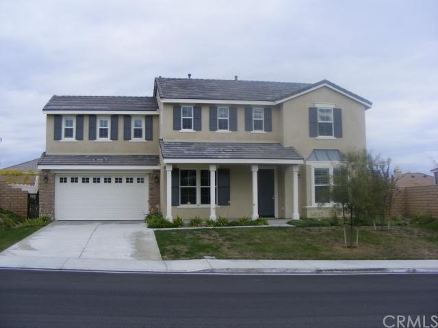 35720 Poplar Crest Road Wildomar, CA 92595 - Photo 1 of 1 a front view of a house with a yard and garage