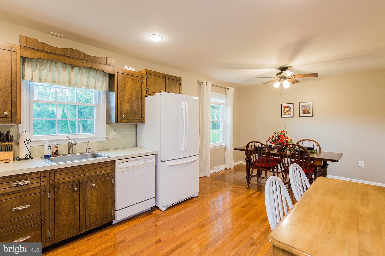 340 Longmeadow Road Lancaster, PA 17601 - Photo 13 of 48 open kitchen/dining area with hardwood floors
