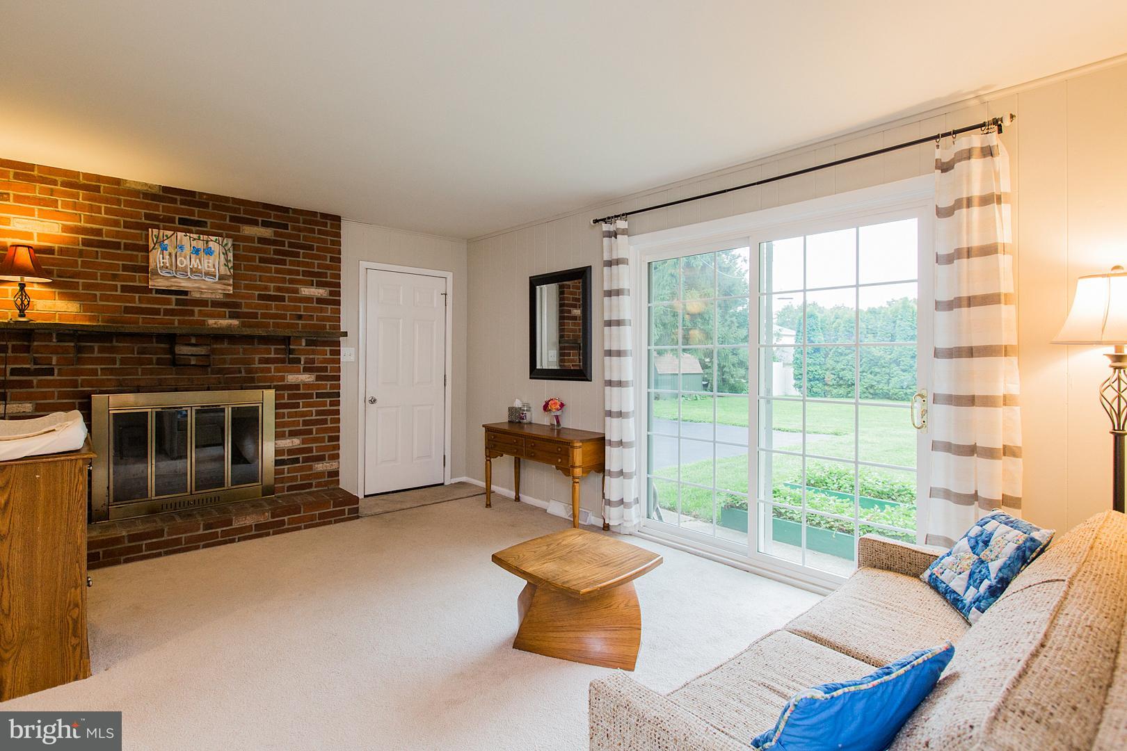 340 Longmeadow Road Lancaster, PA 17601 - Photo 6 of 48 den/office/family room with wood burning fireplace