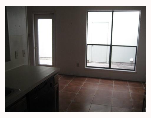 3038 Quail Springs Road, Unit B6 Corpus Christi, TX 78414 - Photo 5 of 7 a view of an empty room with a window