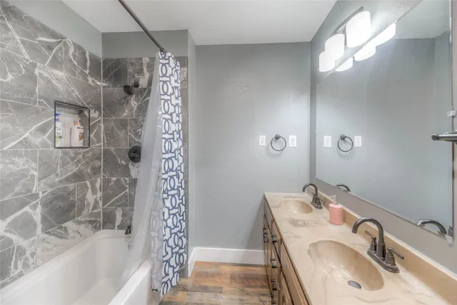 a kitchen with stainless steel appliances granite countertop a refrigerator sink and cabinets