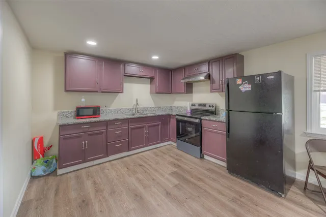 a view of house with a swimming pool