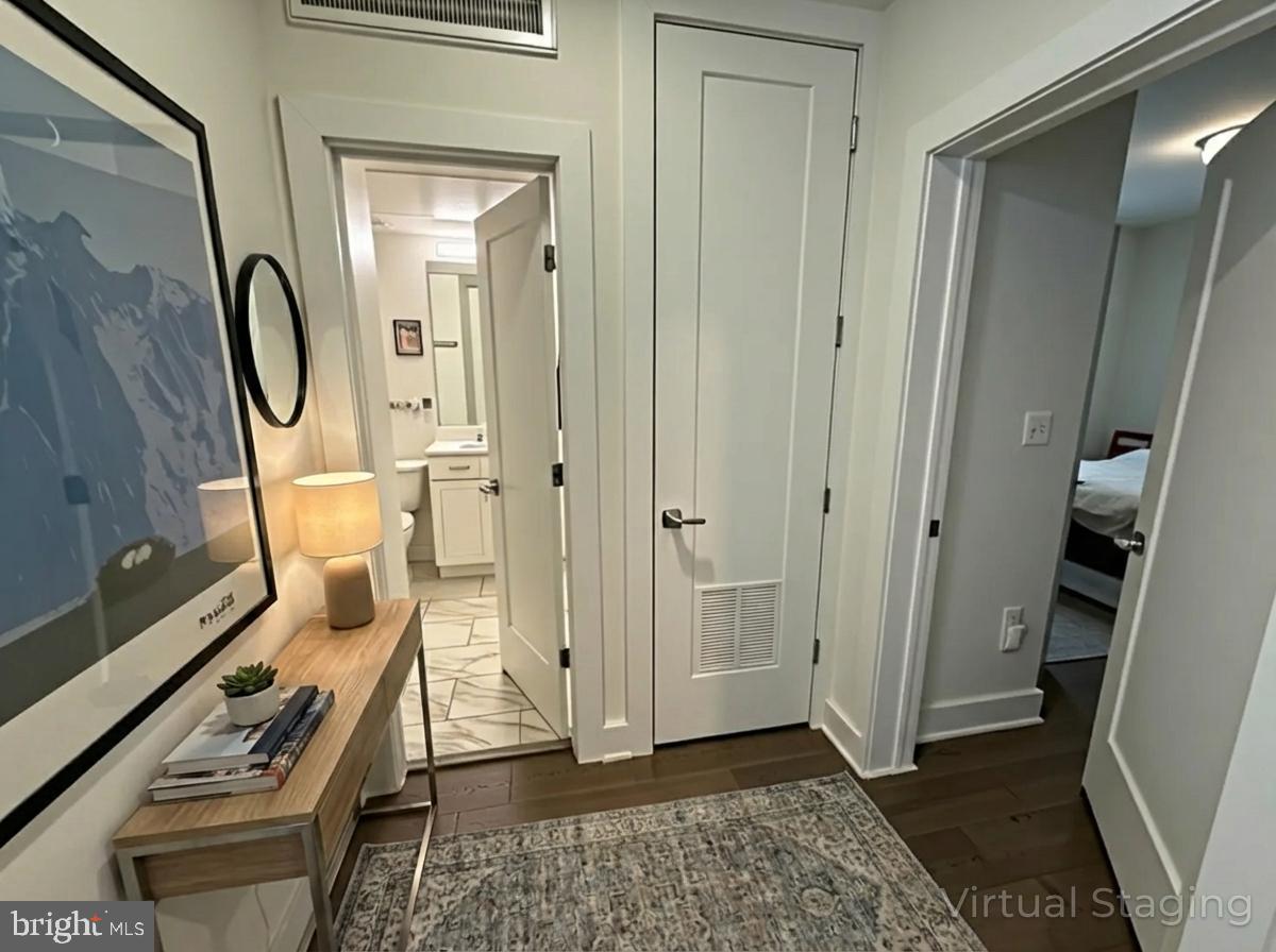 1412 Chapin Street Northwest, Unit 302 Washington, DC 20009 - Photo 12 of 20 Interior LR doors to Bathroom/Washer/Dryer & BR