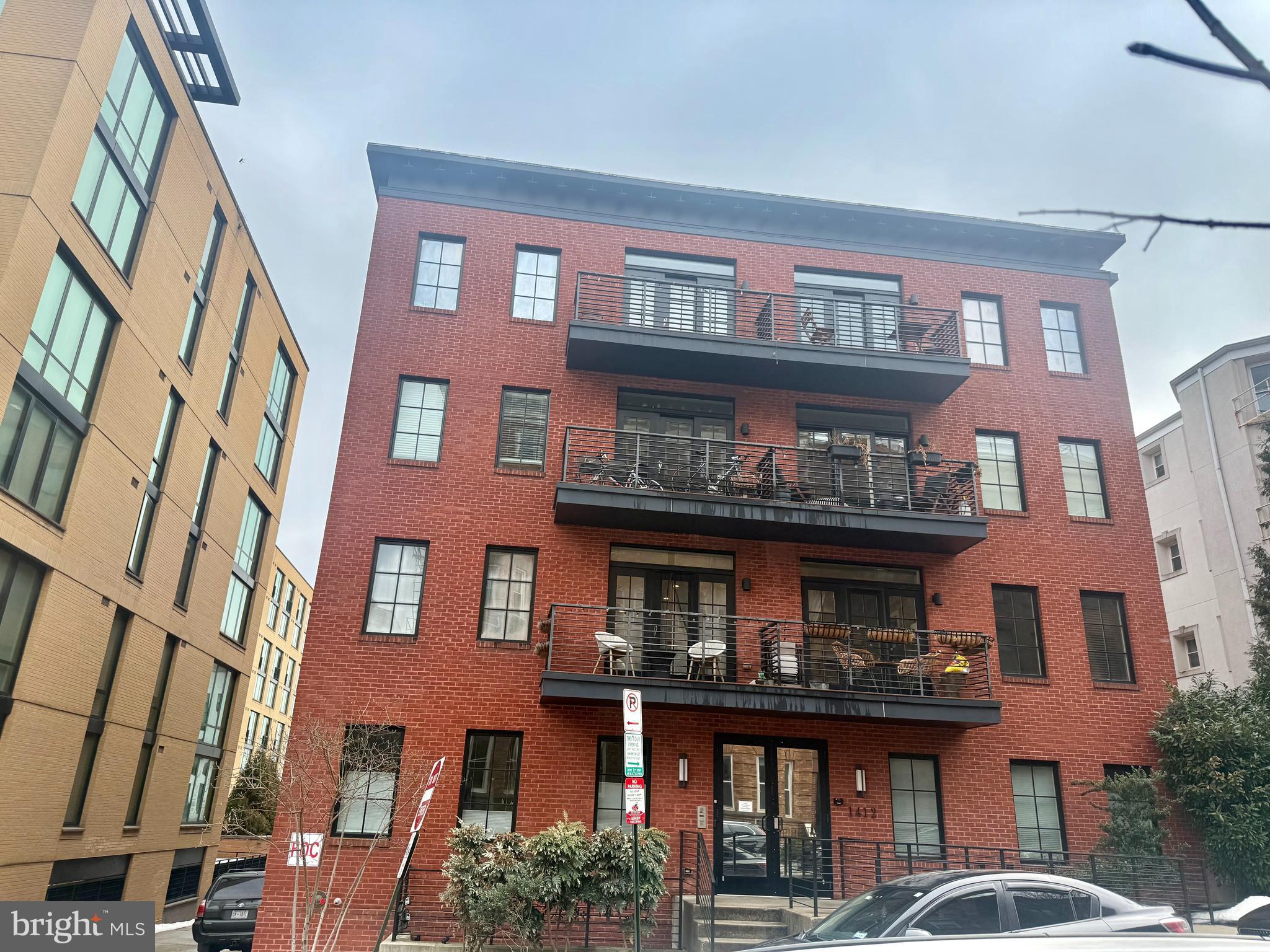 1412 Chapin Street Northwest, Unit 302 Washington, DC 20009 - Photo 2 of 20 a front view of a building with glass windows