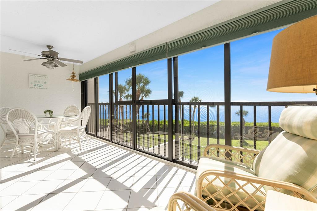 1551 Beach Road, Unit 306 Englewood, FL 34223 - Photo 37 of 50 a view of a living room and a balcony