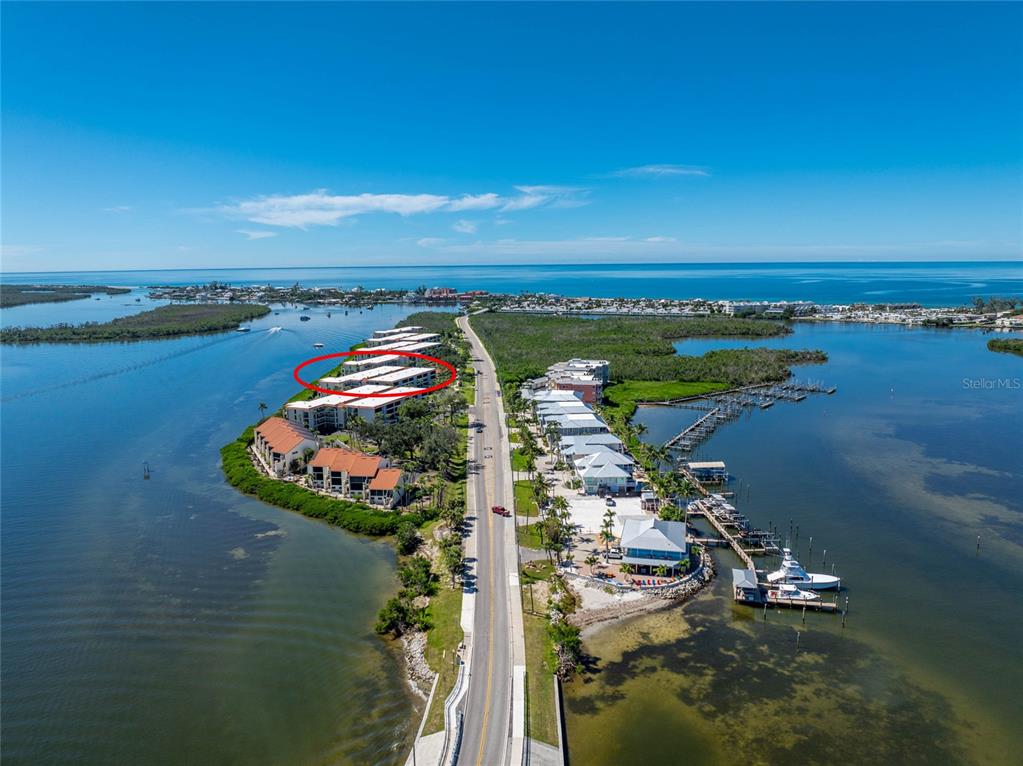 1551 Beach Road, Unit 306 Englewood, FL 34223 - Photo 45 of 50 an aerial view of a house with a lake view