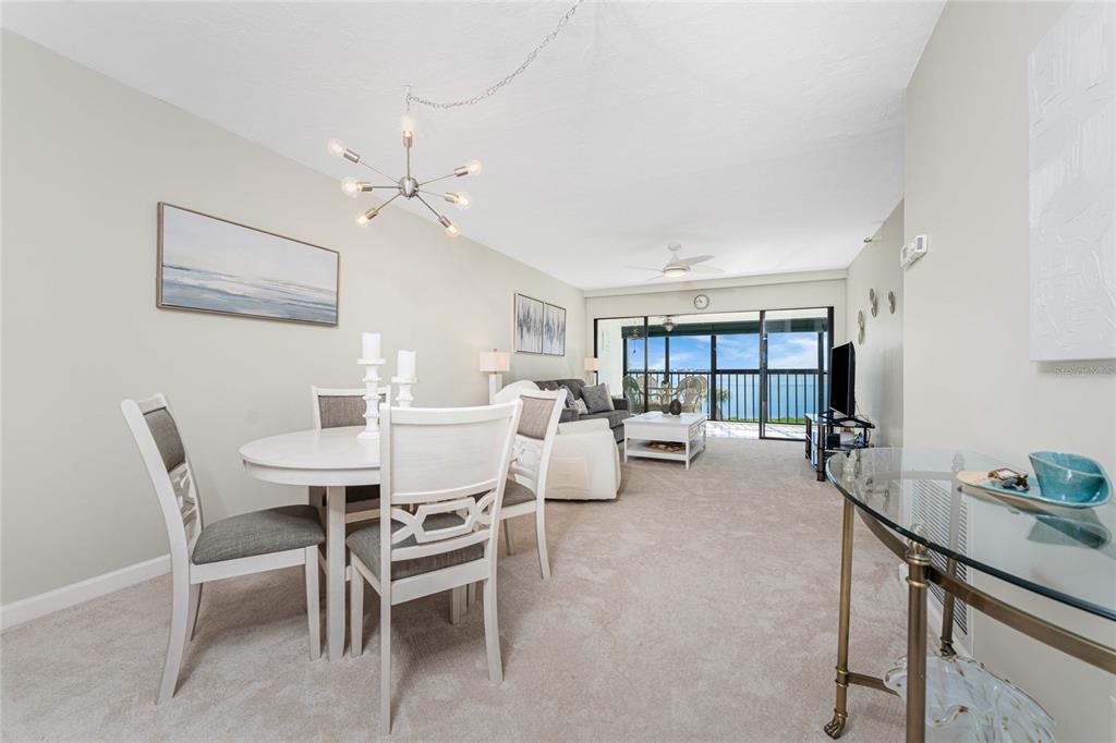 1551 Beach Road, Unit 306 Englewood, FL 34223 - Photo 10 of 50 a view of a dining room with furniture
