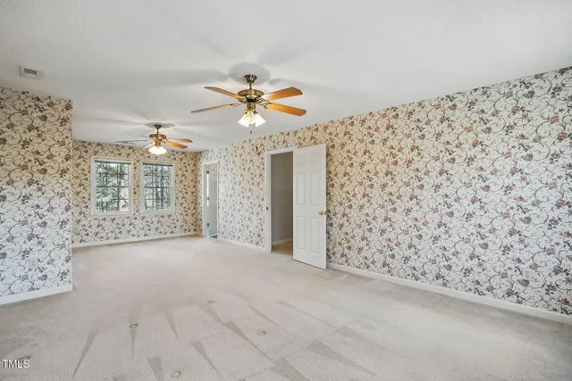 a bathroom with a sink a mirror and a shower