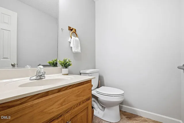 a view of livingroom with furniture and a window
