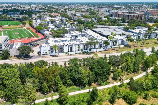 an aerial view of a city with lots of residential buildings