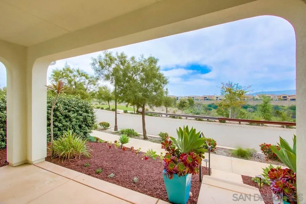 15712 Potomac Ridge Road San Diego, CA 92127 - Photo 2 of 17 a view of a lake with a garden